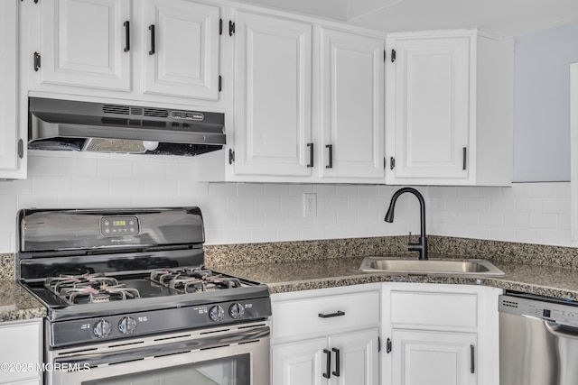 127 Creek Rd Unit 518, Brick, NJ 08724 - kitchen with gas stove, stainless steel dishwasher, under cabinet range hood, a sink, and white cabinets