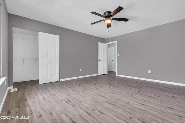 127 Creek Rd Unit 518, Brick, NJ 08724 - unfurnished bedroom featuring wood finished floors, baseboards, a ceiling fan, and a closet