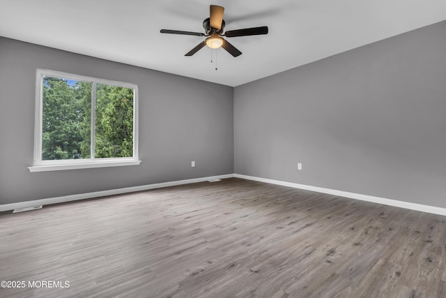 127 Creek Rd Unit 518, Brick, NJ 08724 - unfurnished room featuring baseboards, a ceiling fan, and wood finished floors