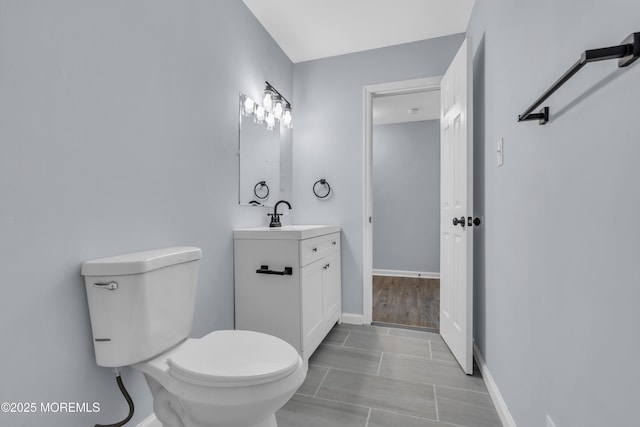 127 Creek Rd Unit 518, Brick, NJ 08724 - bathroom with toilet, baseboards, and vanity