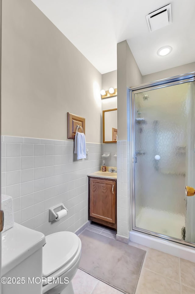3 Virgin Islands Dr, Toms River, NJ 08757 - full bathroom featuring tile walls, tile patterned floors, toilet, a stall shower, and vanity