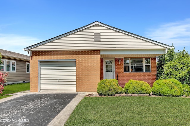 3 Virgin Islands Dr, Toms River, NJ 08757 - view of front of home with driveway, a front lawn, and brick siding