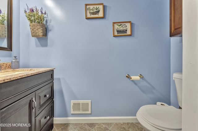 43 Woodledge Ct, Rockaway Twp, NJ 07866 - half bathroom with baseboards, toilet, and vanity