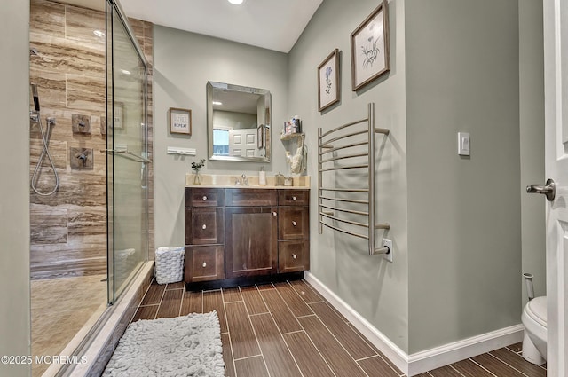 43 Woodledge Ct, Rockaway Twp, NJ 07866 - bathroom with a stall shower, vanity, toilet, baseboards, and recessed lighting