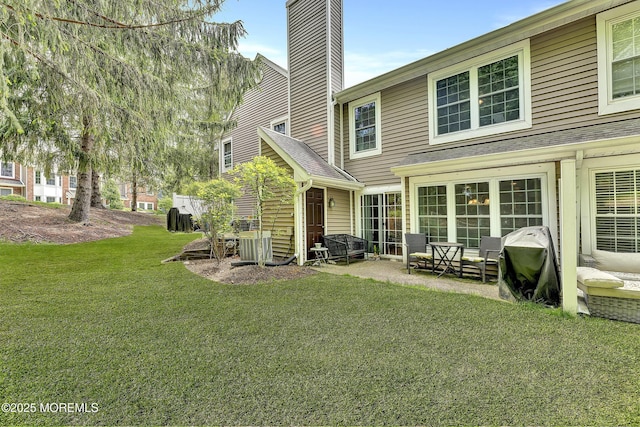 43 Woodledge Ct, Rockaway Twp, NJ 07866 - back of property featuring a yard and a chimney