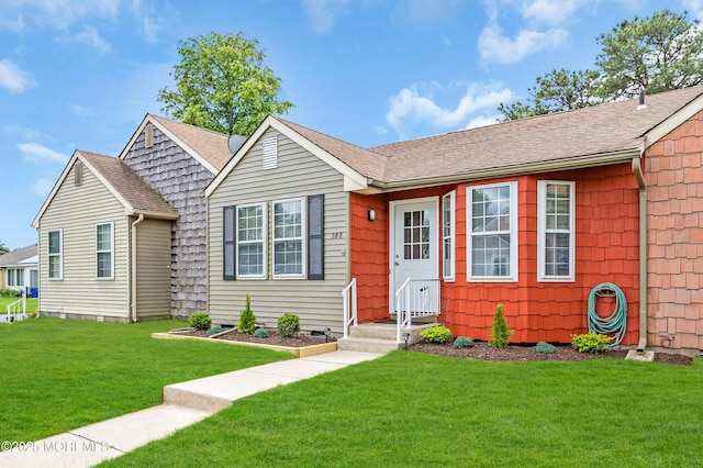 28 Mill Rd Unit B, Whiting, NJ 08759 - view of front of home with a front yard and a shingled roof