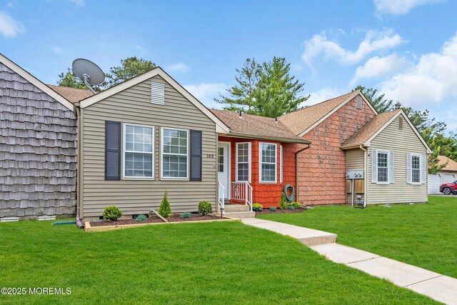 28 Mill Rd Unit B, Whiting, NJ 08759 - view of front facade featuring a front lawn