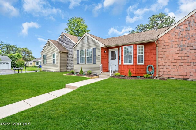 28 Mill Rd Unit B, Whiting, NJ 08759 - view of front of property with a front yard and roof with shingles