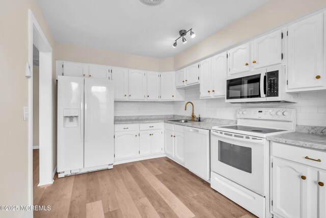 28 Mill Rd Unit B, Whiting, NJ 08759 - kitchen featuring white appliances, a sink, and white cabinets