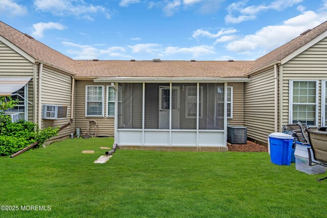 28 Mill Rd Unit B, Whiting, NJ 08759 - back of house with a sunroom, a lawn, and roof with shingles