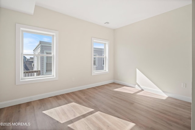 51 Sampson Ave, Seaside Heights, NJ 08751 - empty room featuring baseboards and wood finished floors