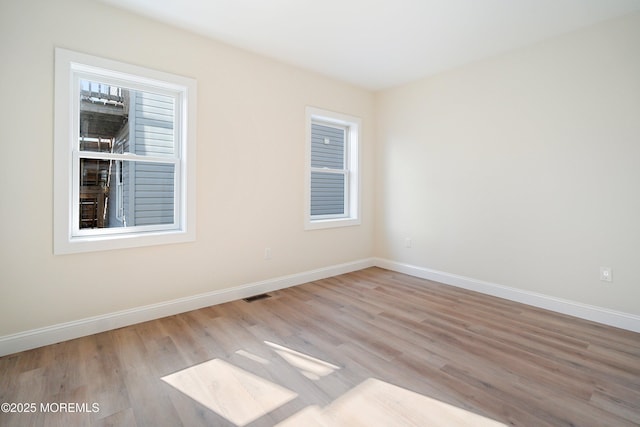 51 Sampson Ave, Seaside Heights, NJ 08751 - spare room featuring baseboards and wood finished floors