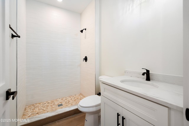 51 Sampson Ave, Seaside Heights, NJ 08751 - bathroom featuring a stall shower, toilet, vanity, and wood finished floors