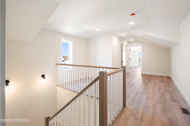 51 Sampson Ave, Seaside Heights, NJ 08751 - hallway with an upstairs landing, light wood-type flooring, recessed lighting, vaulted ceiling, and baseboards
