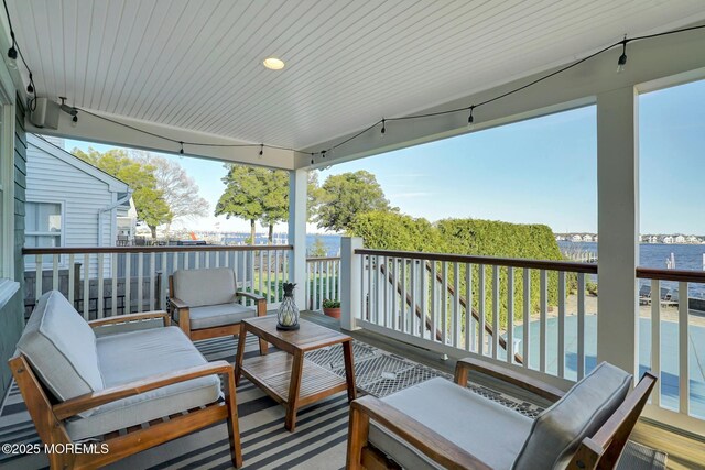 599 Point Ave, Brick, NJ 08724 - wooden deck featuring a water view and an outdoor living space