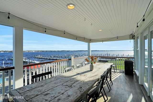 599 Point Ave, Brick, NJ 08724 - wooden terrace with outdoor dining area and a water view