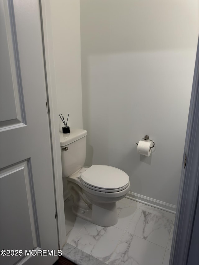 300 Prestige Rd, Brick, NJ 08723 - bathroom featuring marble finish floors, toilet, and baseboards