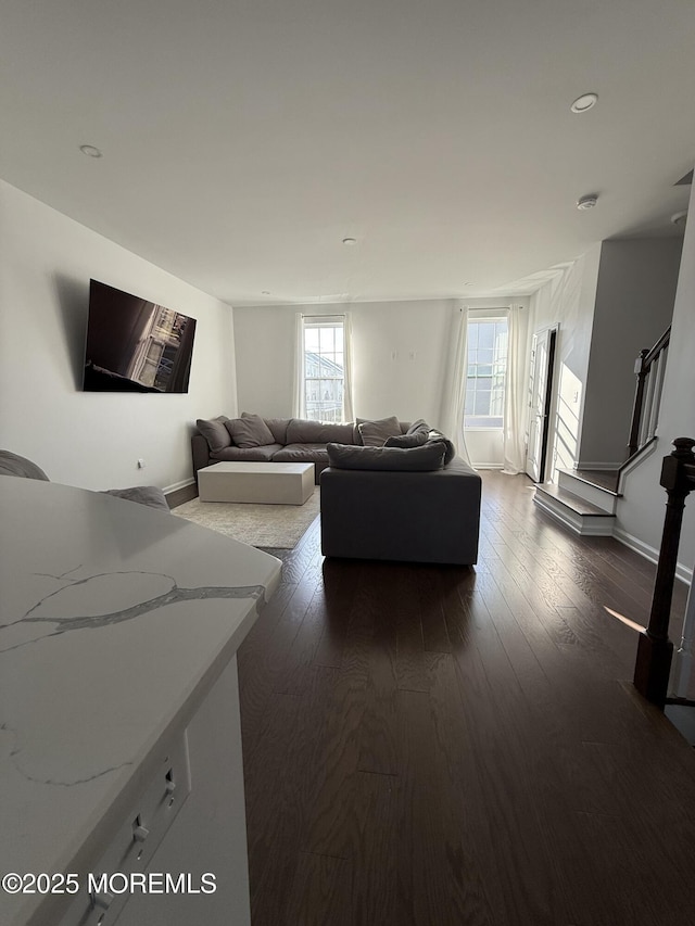 300 Prestige Rd, Brick, NJ 08723 - living room with dark wood-style flooring and stairway
