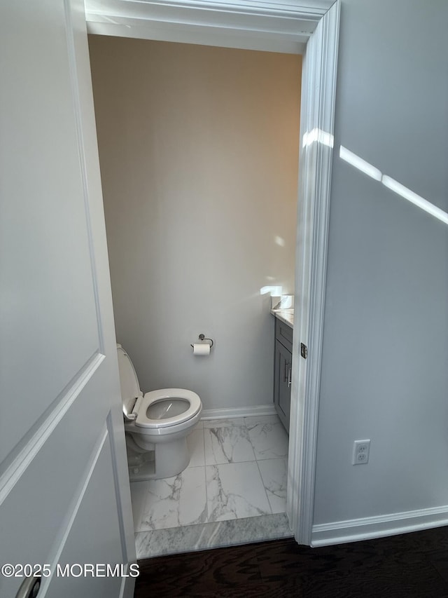 300 Prestige Rd, Brick, NJ 08723 - bathroom with marble finish flooring, vanity, toilet, and baseboards