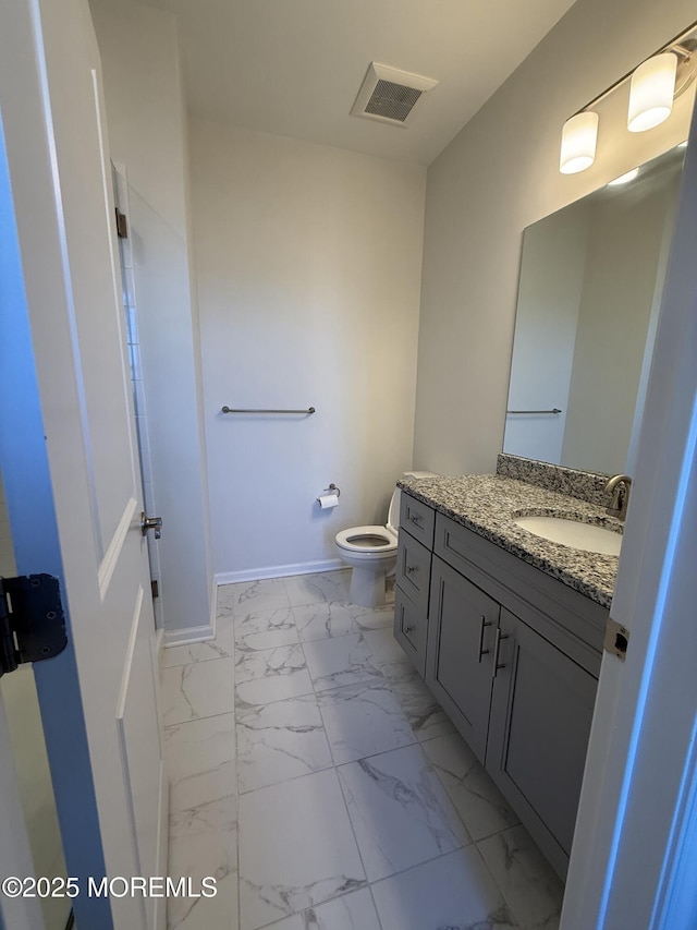 300 Prestige Rd, Brick, NJ 08723 - bathroom featuring marble finish floors, vanity, baseboards, and toilet