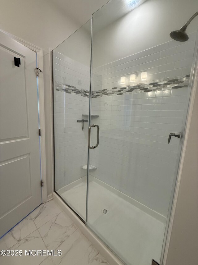 300 Prestige Rd, Brick, NJ 08723 - bathroom featuring a stall shower and marble look tiles