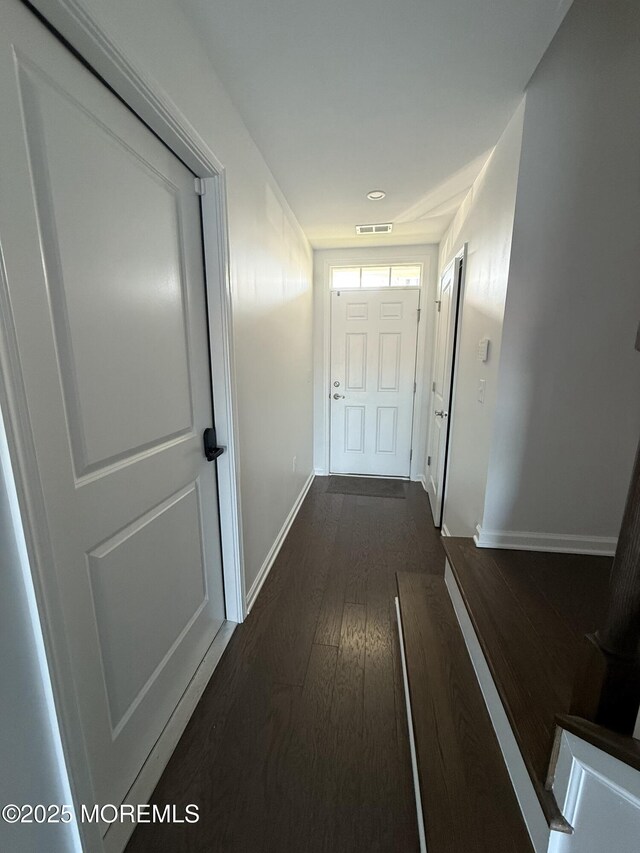 300 Prestige Rd, Brick, NJ 08723 - hall with dark wood-type flooring and baseboards