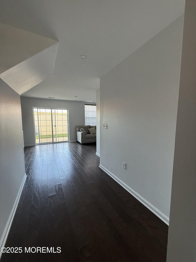 300 Prestige Rd, Brick, NJ 08723 - unfurnished living room featuring dark wood-style flooring and baseboards