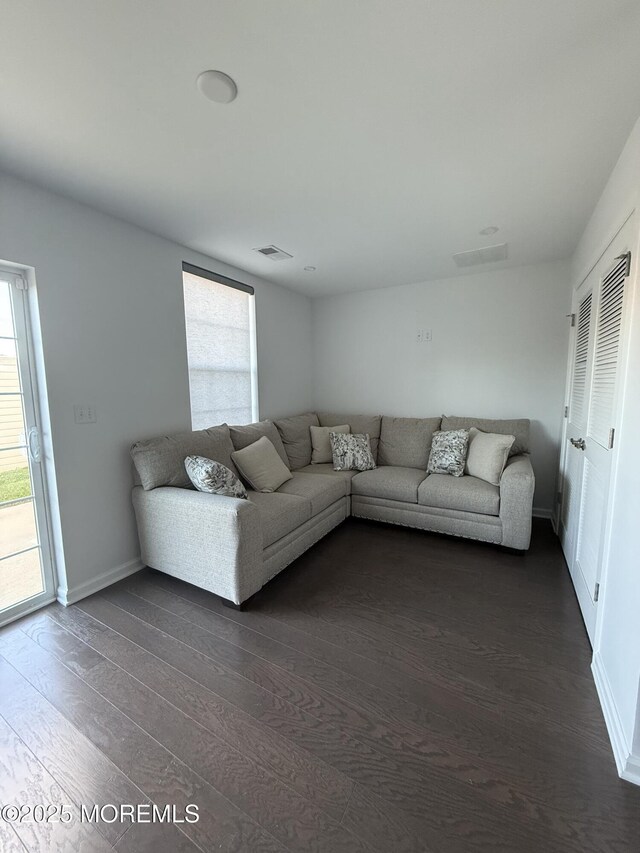 300 Prestige Rd, Brick, NJ 08723 - living room featuring dark wood-type flooring and baseboards