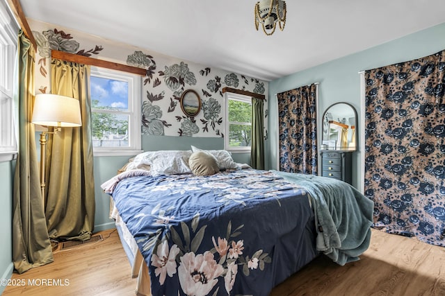 930 Devon St, Forked River, NJ 08731 - bedroom with light wood finished floors, multiple windows, and baseboards