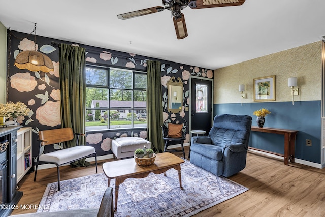 930 Devon St, Forked River, NJ 08731 - living area featuring a ceiling fan, plenty of natural light, wood finished floors, wallpapered walls, and baseboards