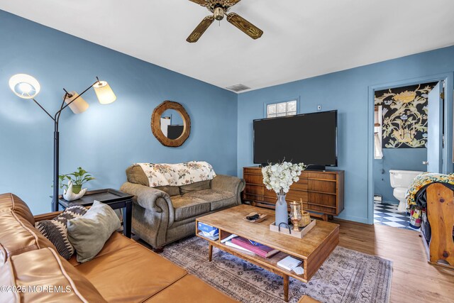 930 Devon St, Forked River, NJ 08731 - living room with a ceiling fan, wood finished floors, and baseboards