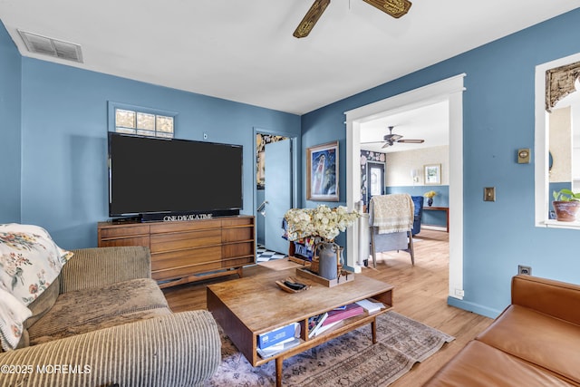 930 Devon St, Forked River, NJ 08731 - living room with ceiling fan, wood finished floors, and baseboards