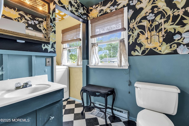 930 Devon St, Forked River, NJ 08731 - bathroom featuring toilet, tile patterned floors, a baseboard heating unit, vanity, and baseboards