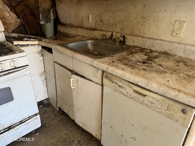 614 Beach Blvd, Forked River, NJ 08731 - kitchen with white gas range oven, a sink, and light countertops