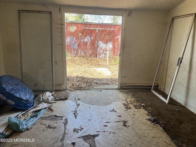 614 Beach Blvd, Forked River, NJ 08731 - doorway to outside featuring a textured ceiling