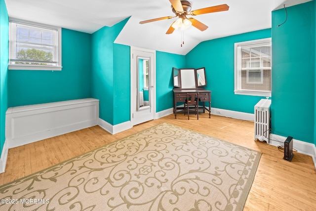 10 Fulton St, Freehold, NJ 07728 - sitting room with ceiling fan, wood finished floors, baseboards, vaulted ceiling, and radiator