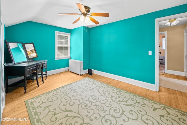 10 Fulton St, Freehold, NJ 07728 - office area featuring radiator, a ceiling fan, wood finished floors, baseboards, and vaulted ceiling