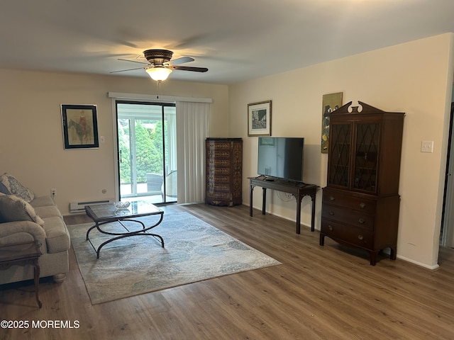 12 Medford Ct, Red Bank, NJ 07701 - living area featuring a baseboard radiator, ceiling fan, wood finished floors, and baseboards