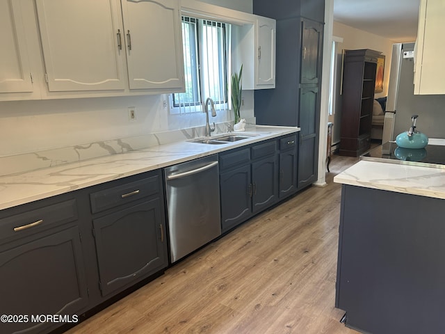 12 Medford Ct, Red Bank, NJ 07701 - kitchen with stainless steel appliances, a sink, light wood-type flooring, and light stone countertops