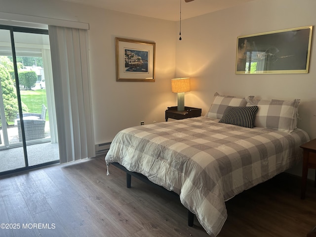 12 Medford Ct, Red Bank, NJ 07701 - bedroom featuring wood finished floors, a baseboard heating unit, and access to exterior
