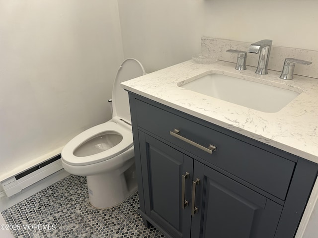 12 Medford Ct, Red Bank, NJ 07701 - bathroom with vanity, a baseboard radiator, toilet, and tile patterned flooring