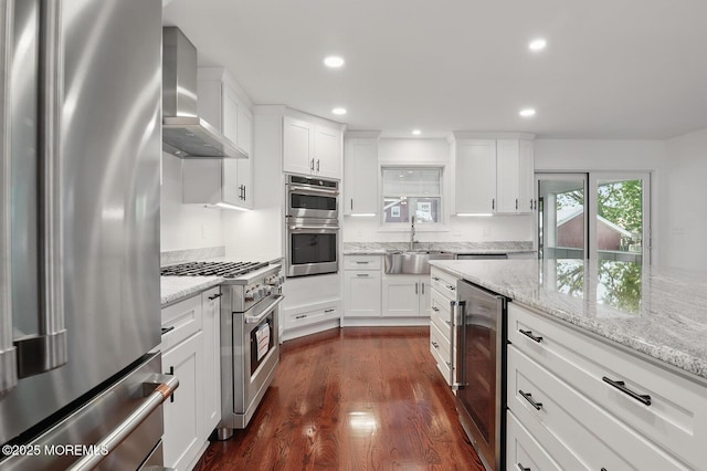 18 Neptune Pl, North Middletown, NJ 07748 - kitchen with stainless steel appliances, wall chimney range hood, a sink, beverage cooler, and dark wood finished floors