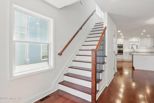 18 Neptune Pl, North Middletown, NJ 07748 - stairs with wood finished floors, recessed lighting, and baseboards