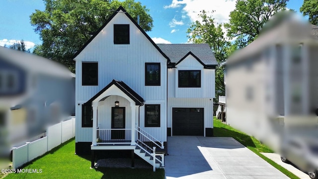 18 Neptune Pl, North Middletown, NJ 07748 - modern inspired farmhouse with concrete driveway, an attached garage, and a shingled roof