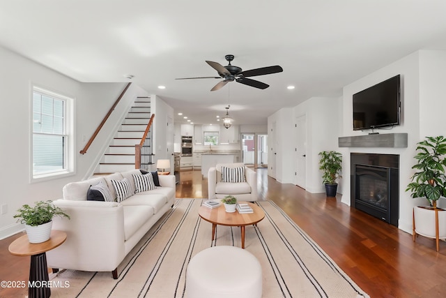 18 Neptune Pl, North Middletown, NJ 07748 - living area with light wood finished floors, stairs, a ceiling fan, plenty of natural light, and recessed lighting
