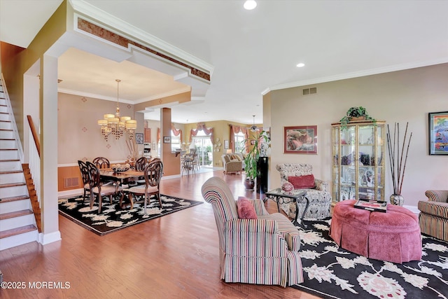 7 Jester Ct, Monroe, NJ 08831 - living room with a chandelier, stairway, wood finished floors, recessed lighting, and baseboards