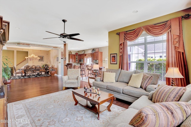 7 Jester Ct, Monroe, NJ 08831 - living area with a chandelier, wood finished floors, and a ceiling fan