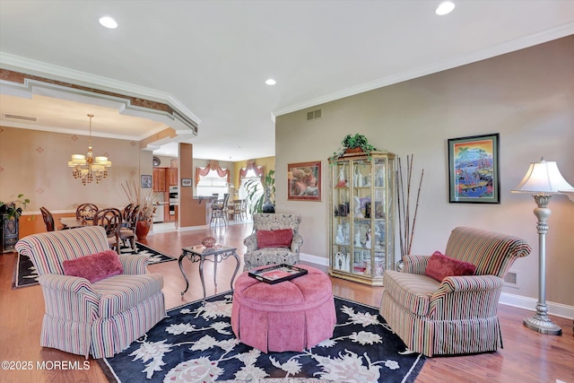 7 Jester Ct, Monroe, NJ 08831 - living room with a chandelier, wood finished floors, baseboards, crown molding, and recessed lighting