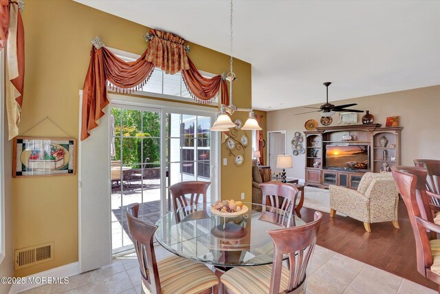 7 Jester Ct, Monroe, NJ 08831 - dining space with light tile patterned floors, ceiling fan, and baseboards