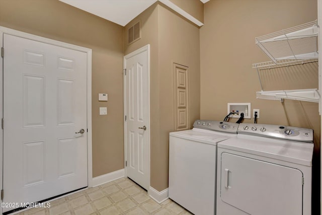 7 Jester Ct, Monroe, NJ 08831 - laundry area featuring separate washer and dryer, light floors, and baseboards
